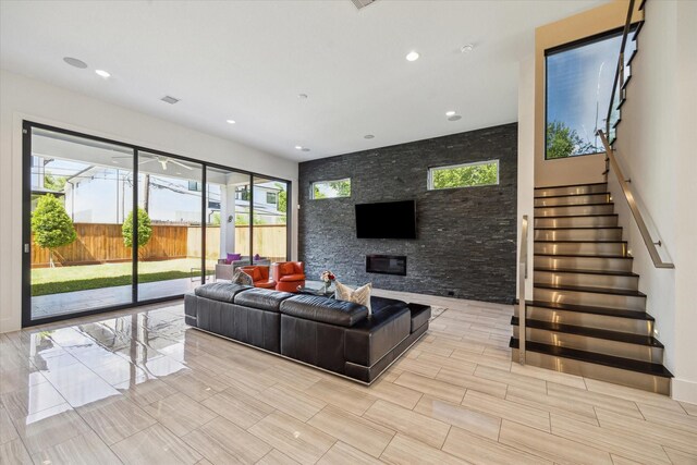5430 Judalon Ln, Houston, TX 77056 - living area with stairs, recessed lighting, and a fireplace