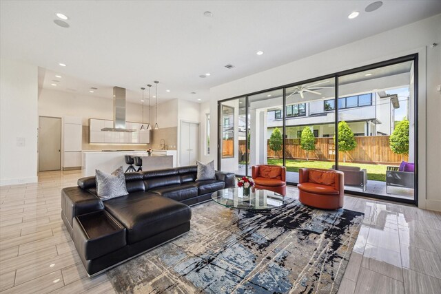 5430 Judalon Ln, Houston, TX 77056 - living room with a ceiling fan, recessed lighting, and baseboards