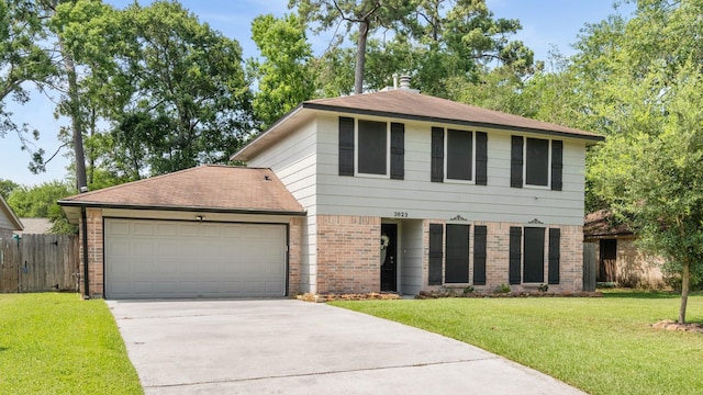 3623 Wells Mark Dr, Humble, TX 77396 - view of front of house featuring brick siding, driveway, a garage, and roof with shingles