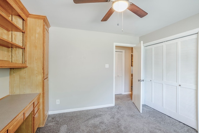 8015 Durklyn Ln, Houston, TX 77070 - unfurnished bedroom featuring light colored carpet, a closet, a ceiling fan, and baseboards