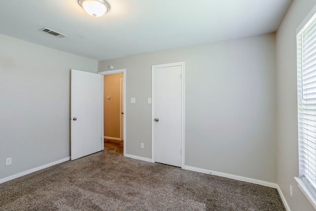 8015 Durklyn Ln, Houston, TX 77070 - unfurnished bedroom featuring carpet and baseboards