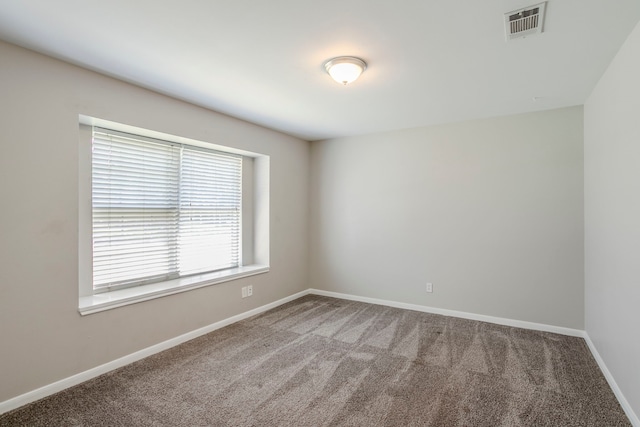 8015 Durklyn Ln, Houston, TX 77070 - spare room featuring carpet flooring and baseboards