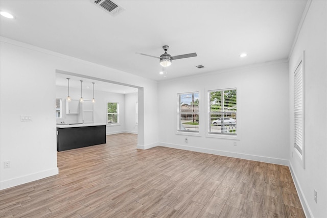4358 Larkspur St, Houston, TX 77051 - unfurnished living room featuring a ceiling fan, light wood-type flooring, recessed lighting, ornamental molding, and baseboards
