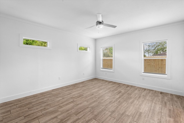 4358 Larkspur St, Houston, TX 77051 - spare room with plenty of natural light, wood finished floors, ornamental molding, a ceiling fan, and baseboards