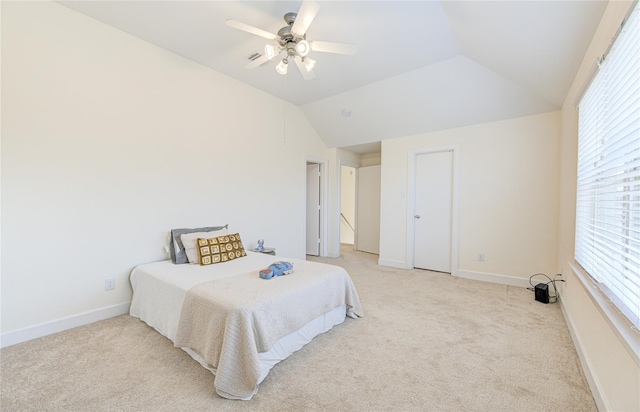 11509 Main Ash, Houston, TX 77025 - bedroom featuring light colored carpet, baseboards, vaulted ceiling, and a ceiling fan