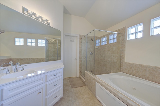 11509 Main Ash, Houston, TX 77025 - bathroom featuring healthy amount of natural light, a stall shower, tile patterned floors, a jetted tub, and vaulted ceiling