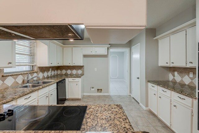 7803 Hurst Forest Dr, Humble, TX 77346 - kitchen featuring a sink, black appliances, backsplash, and light tile patterned floors
