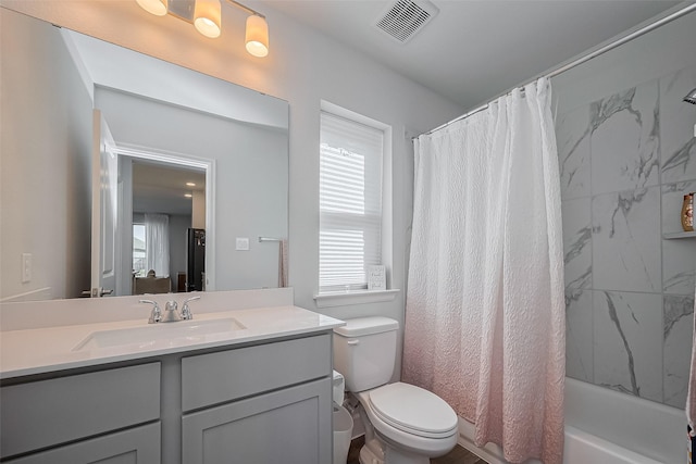 11430 Bush Clover Dr, Cypress, TX 77433 - full bath with toilet, vanity, and shower / bath combination with curtain