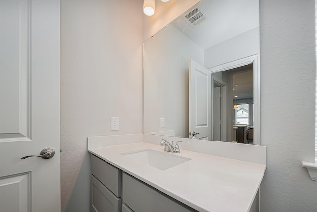 11430 Bush Clover Dr, Cypress, TX 77433 - bathroom featuring vanity and a textured wall