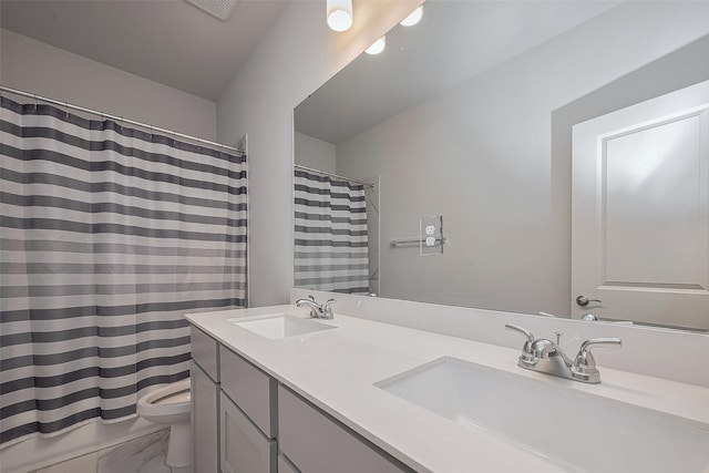 11430 Bush Clover Dr, Cypress, TX 77433 - bathroom with toilet, double vanity, marble finish floors, and a shower with shower curtain