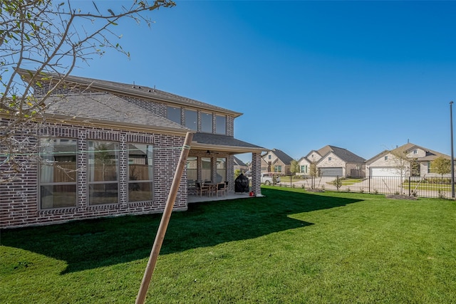 11430 Bush Clover Dr, Cypress, TX 77433 - view of yard featuring a patio area and a residential view
