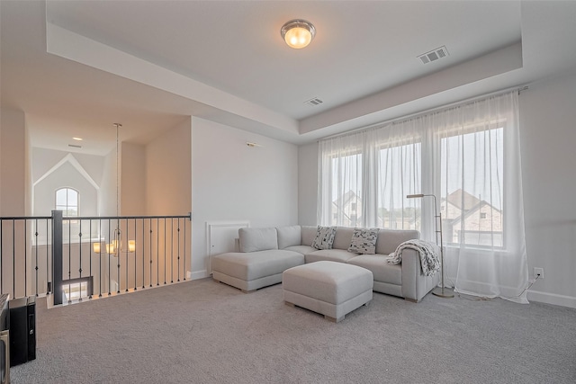 11430 Bush Clover Dr, Cypress, TX 77433 - carpeted living area featuring healthy amount of natural light and baseboards