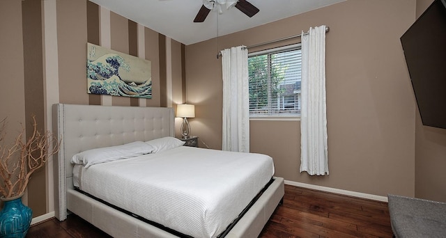 87 S Bluff Creek Cir, The Woodlands, TX 77382 - bedroom with baseboards, hardwood / wood-style floors, and ceiling fan