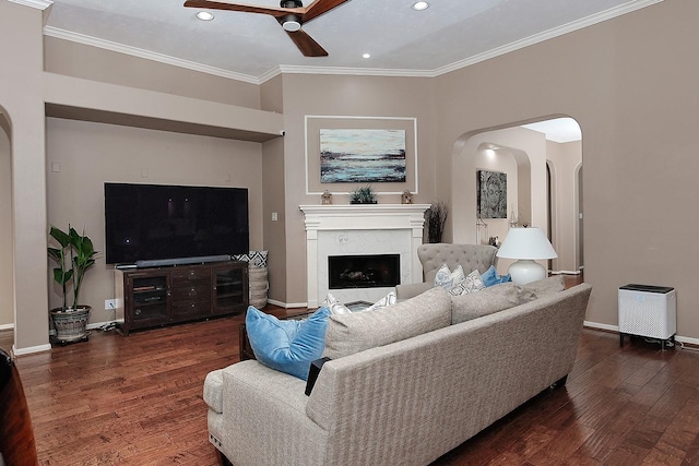 87 S Bluff Creek Cir, The Woodlands, TX 77382 - living room with ceiling fan, arched walkways, wood finished floors, recessed lighting, and ornamental molding