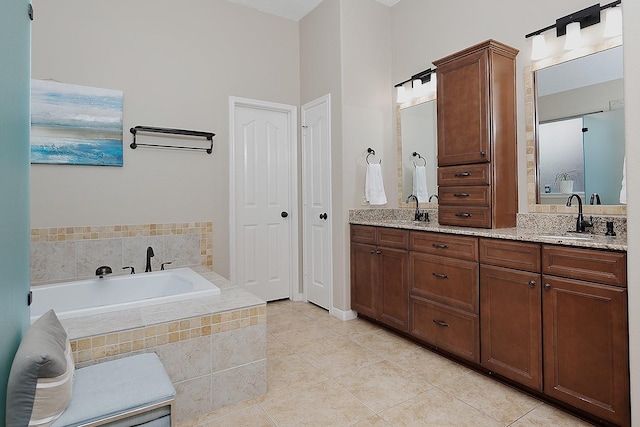87 S Bluff Creek Cir, The Woodlands, TX 77382 - full bath with tile patterned floors, a bath, and double vanity