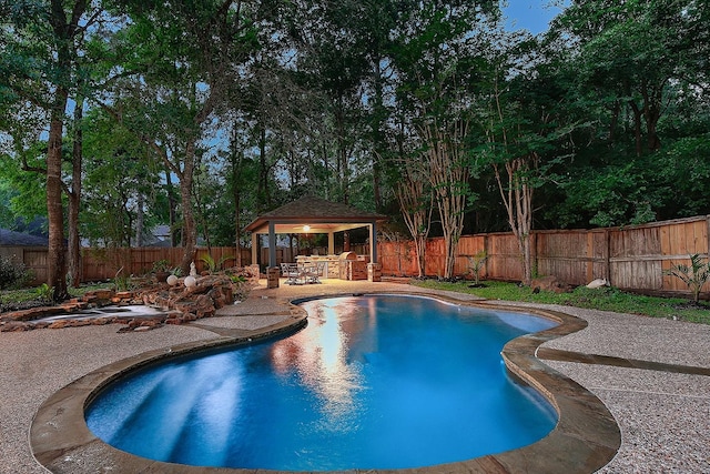 87 S Bluff Creek Cir, The Woodlands, TX 77382 - view of swimming pool featuring a fenced backyard, a gazebo, and a patio