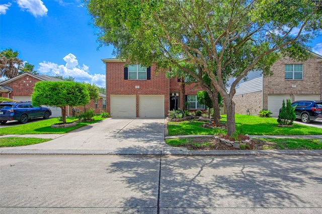 4705 Foster Hill Ct, Houston, TX 77345 - view of front of house featuring an attached garage, driveway, brick siding, and a front yard