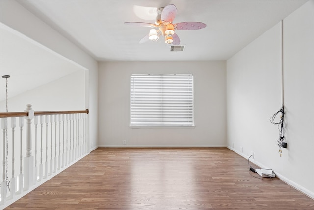 4705 Foster Hill Ct, Houston, TX 77345 - spare room with ceiling fan, wood finished floors, and baseboards