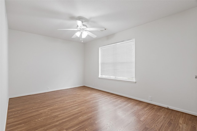 4705 Foster Hill Ct, Houston, TX 77345 - unfurnished room with wood finished floors, ceiling fan, and baseboards