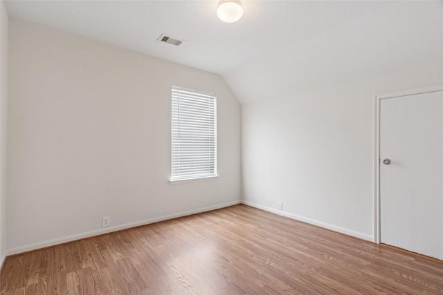 4705 Foster Hill Ct, Houston, TX 77345 - additional living space featuring light wood-type flooring, baseboards, and vaulted ceiling
