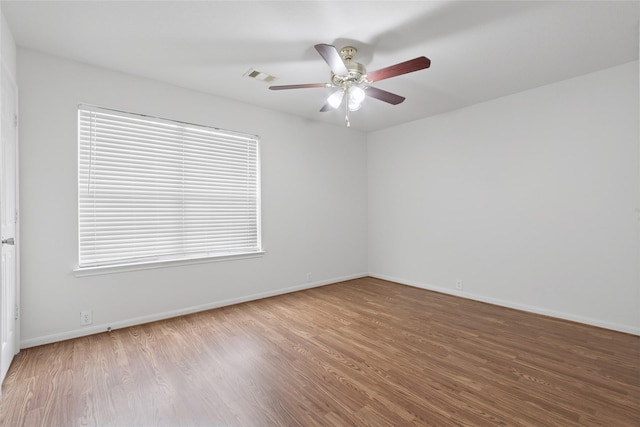 4705 Foster Hill Ct, Houston, TX 77345 - spare room featuring wood finished floors, ceiling fan, and baseboards