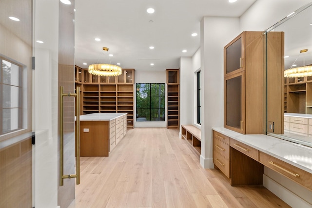 full bath featuring wood finished floors, vanity, and recessed lighting