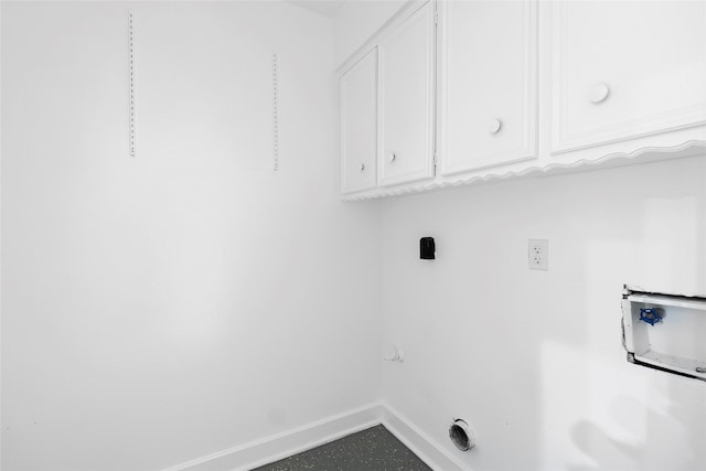 233 Royal Oaks St, Huntsville, TX 77320 - clothes washing area with cabinet space, baseboards, and hookup for a washing machine