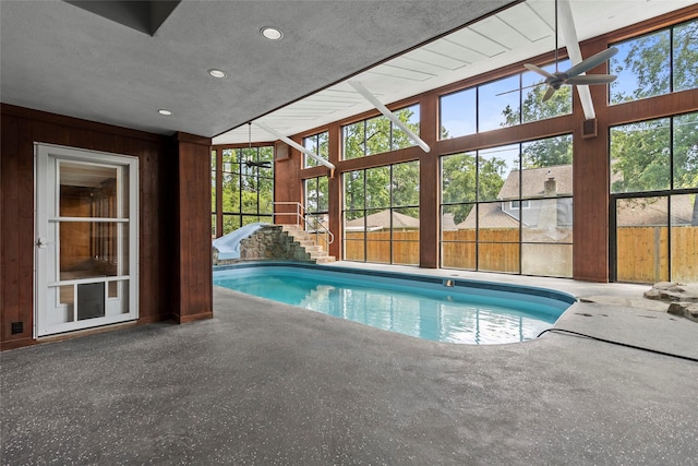 233 Royal Oaks St, Huntsville, TX 77320 - indoor pool featuring a patio and a water slide
