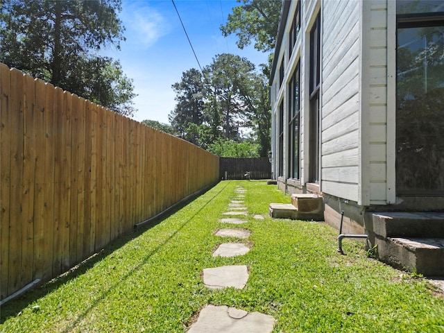 233 Royal Oaks St, Huntsville, TX 77320 - view of yard featuring entry steps