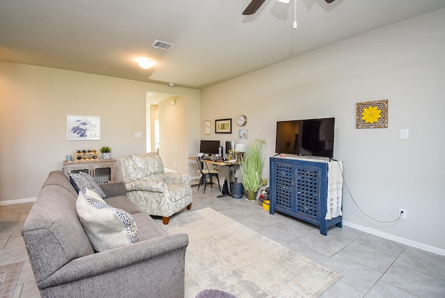 7303 Barrington Ridge Ln, Richmond, TX 77407 - living room with light tile patterned flooring, an office area, ceiling fan, and baseboards