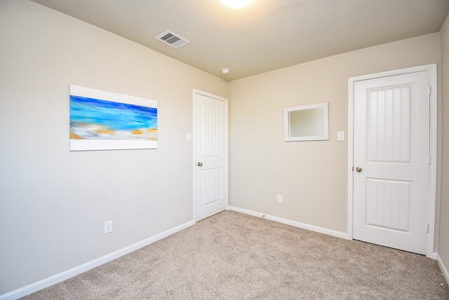 7303 Barrington Ridge Ln, Richmond, TX 77407 - unfurnished bedroom featuring carpet floors and baseboards