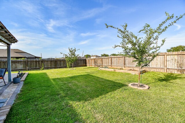 7303 Barrington Ridge Ln, Richmond, TX 77407 - view of yard featuring a vegetable garden