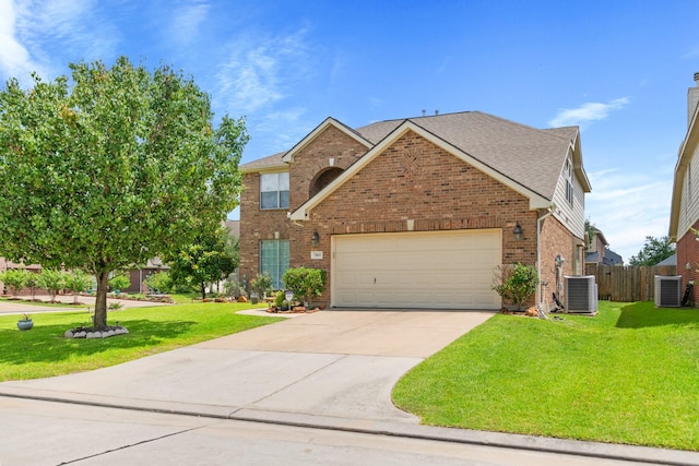 7103 Uther Ct, Spring, TX 77379 - traditional-style home featuring central air condition unit, brick siding, a garage, and concrete driveway