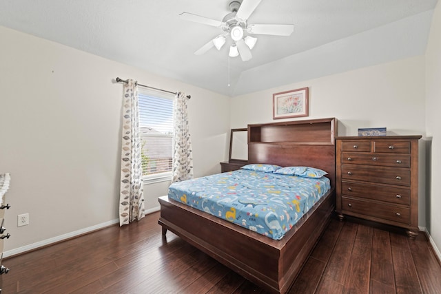 7103 Uther Ct, Spring, TX 77379 - bedroom with dark wood-style flooring, baseboards, lofted ceiling, and a ceiling fan