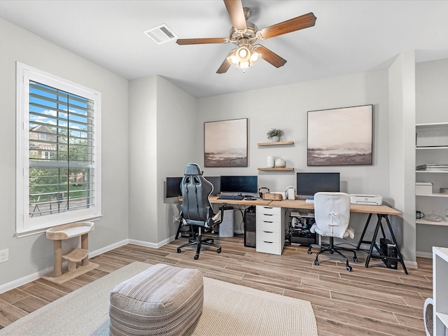 711 Summer Trace Ln, Richmond, TX 77406 - office space featuring wood finished floors, ceiling fan, and baseboards