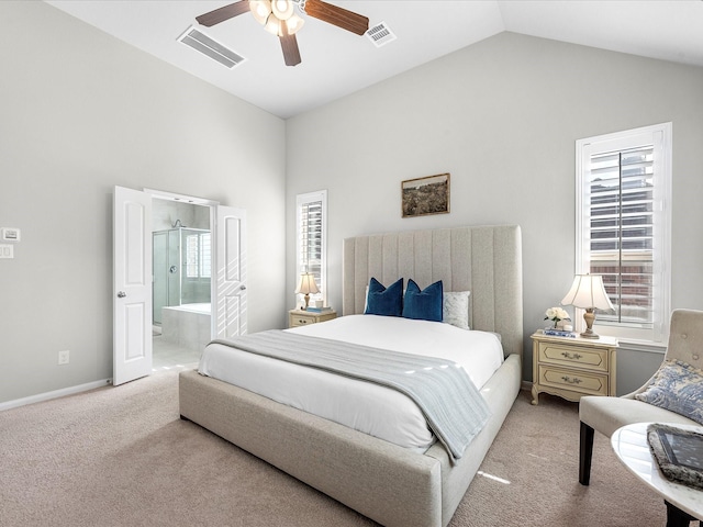 711 Summer Trace Ln, Richmond, TX 77406 - bedroom with carpet flooring, multiple windows, lofted ceiling, ensuite bathroom, and baseboards