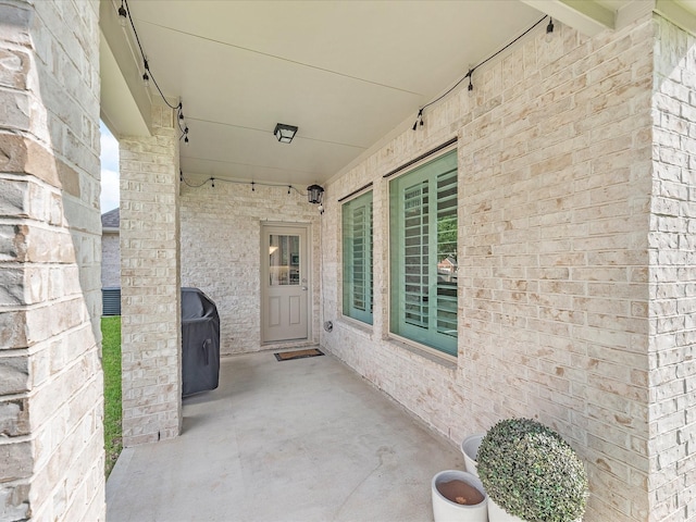 711 Summer Trace Ln, Richmond, TX 77406 - view of exterior entry featuring brick siding