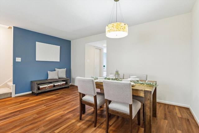 2065 Winrock Blvd Unit 55, Houston, TX 77057 - dining room featuring wood finished floors and baseboards