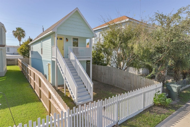 1511 Mechanic St, Galveston, TX 77550 - view of front of property featuring stairway