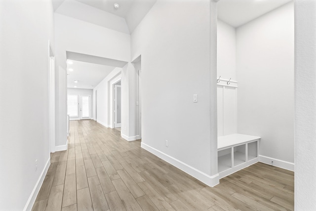 19331 Wild Sabino Way, Tomball, TX 77377 - hall featuring wood finished floors and baseboards