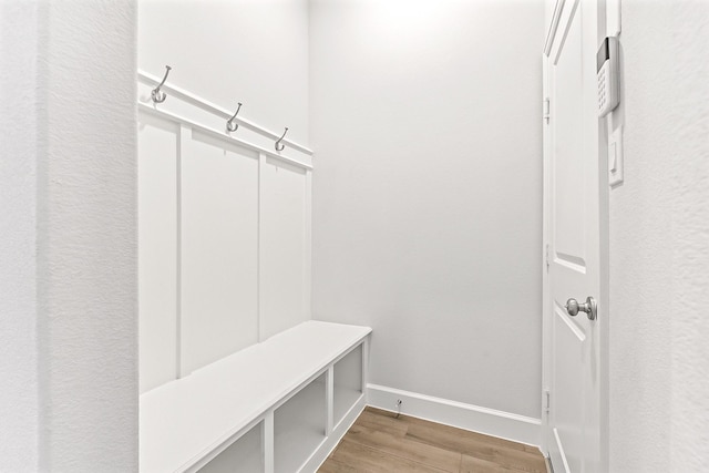 19331 Wild Sabino Way, Tomball, TX 77377 - mudroom featuring wood finished floors and baseboards