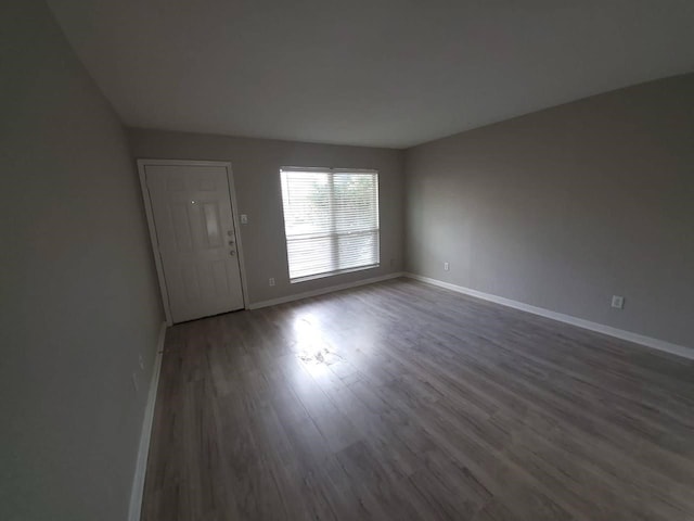 8100 Creekbend Dr Unit 135, Houston, TX 77071 - spare room featuring wood finished floors and baseboards