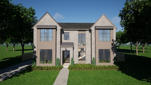view of front of home featuring a front lawn and brick siding
