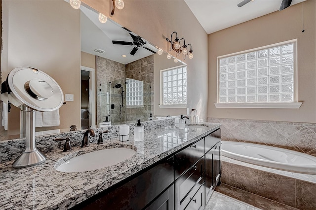 5123 Wheaton Park Dr, Sugar Land, TX 77479 - full bath featuring a shower stall, ceiling fan, a bath, and double vanity