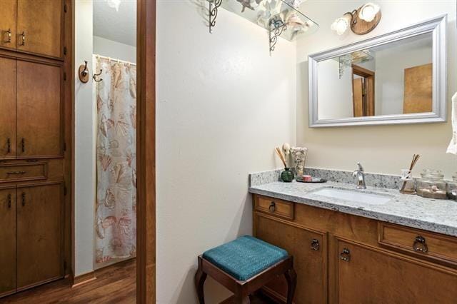 527 E Walton Rd, Lumberton, TX 77657 - full bath with vanity and wood finished floors
