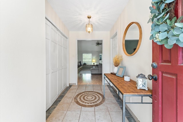 211 4th St, Dickinson, TX 77539 - tiled foyer entrance featuring ceiling fan