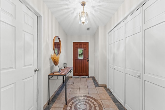 211 4th St, Dickinson, TX 77539 - entrance foyer featuring baseboards and inlaid floor details