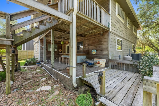 211 4th St, Dickinson, TX 77539 - wooden terrace with fence and cooling unit