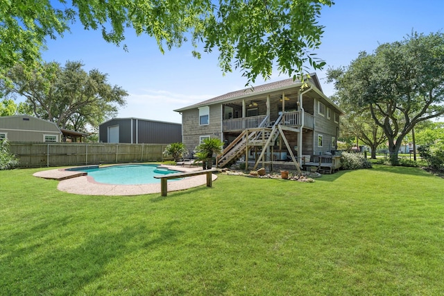211 4th St, Dickinson, TX 77539 - back of house featuring a ceiling fan, stairs, and a wooden deck