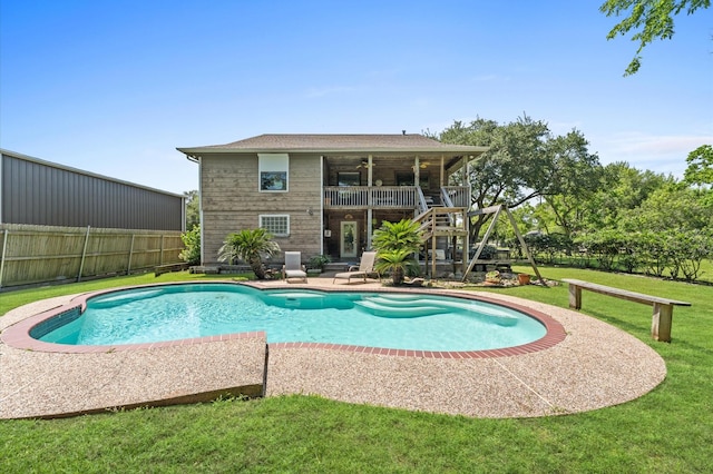 211 4th St, Dickinson, TX 77539 - view of swimming pool with ceiling fan, stairway, and a patio area